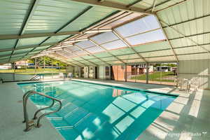Indoor pool with a patio