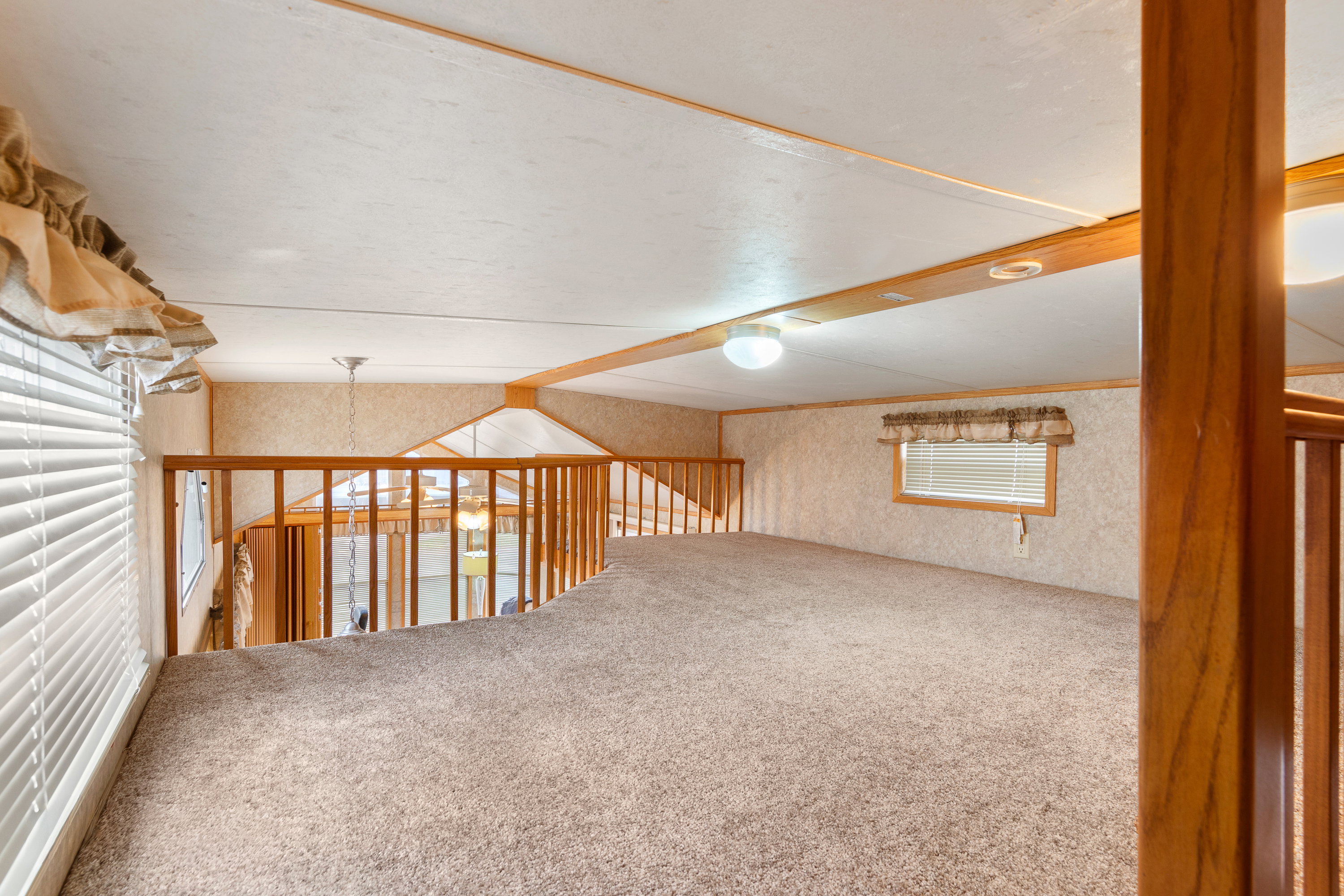 Unfurnished room with carpet floors