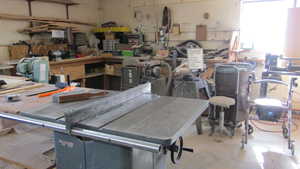 Garage featuring a workshop area