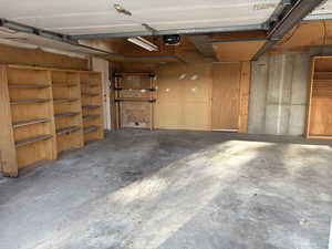 Garage featuring a garage door opener