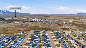 Aerial view of residential area with a mountainous background
