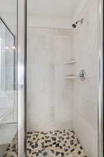 Bathroom with a shower stall