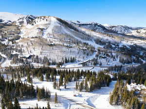 Snowy aerial view with a mountain view