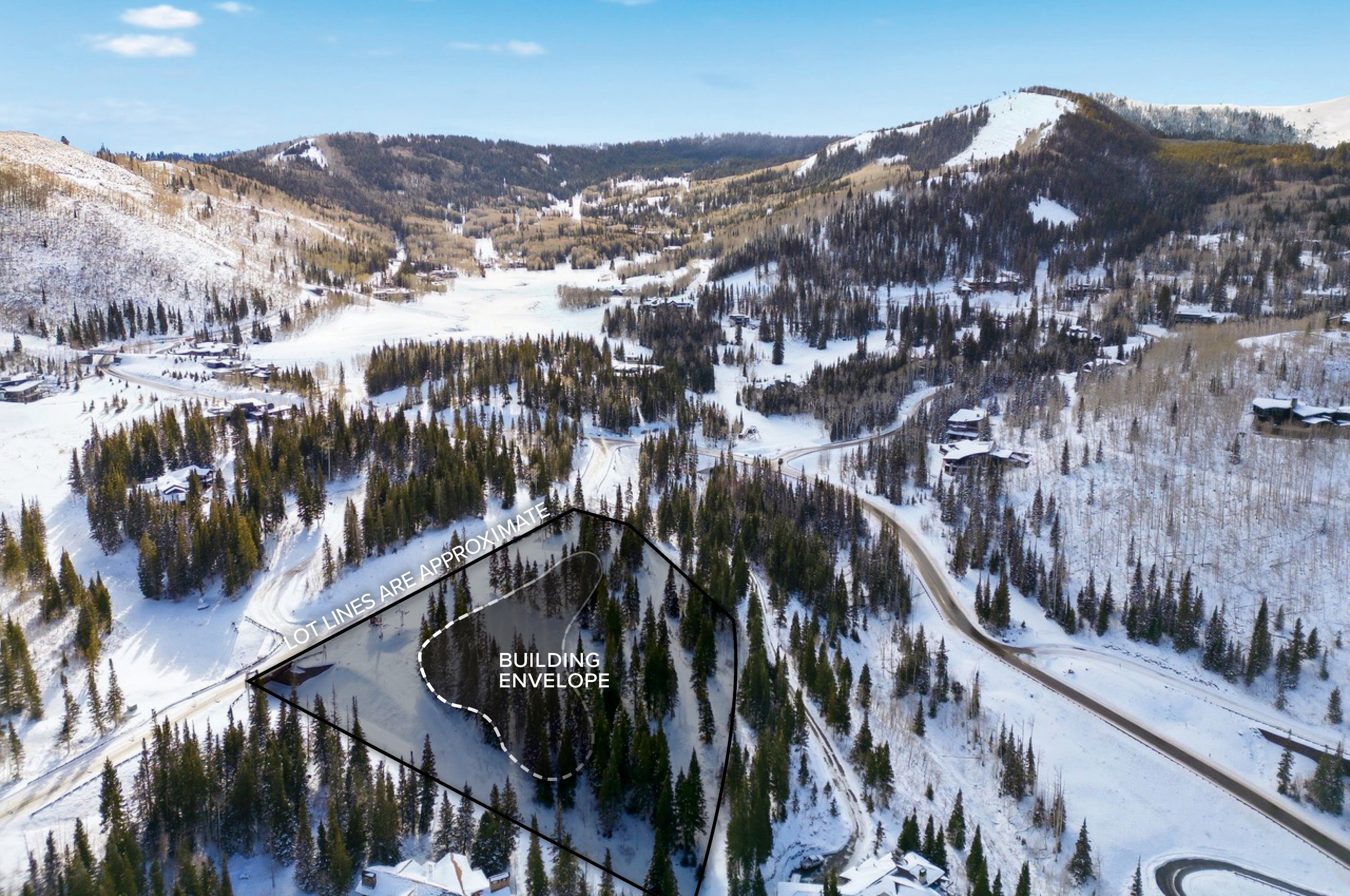 Snowy aerial view with a mountain view