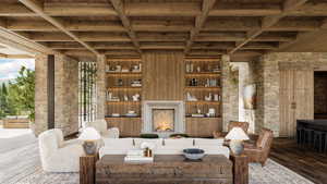 Living area with a wood ceiling with exposed beams, coffered ceiling, and a lit fireplace