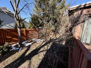View of fenced backyard