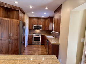 Kitchen with plenty of space to prepare meals with plenty of high end beautiful cabinets for storage
