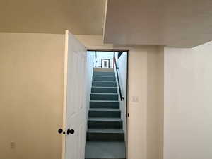 Basement access to garage through door and staircase