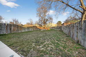 View of fenced backyard