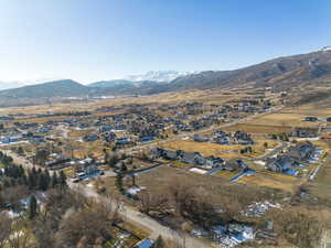 Aerial perspective of suburban area featuring mountains
