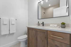 Full bathroom featuring vanity and a shower