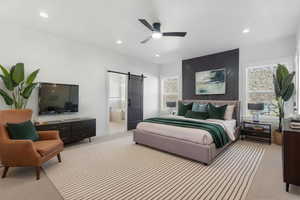 Enhanced photo of the staged primary suite