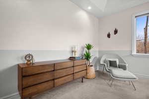 Main Suite with carpet and recessed lighting