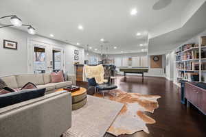 Living room featuring french doors, hardwood / wood-style flooring, pool table, and recessed lighting