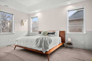 Main Suite with carpet floors and recessed lighting