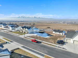 Aerial view of residential area with a mountain backdrop