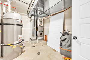 Utility room with secured water heater