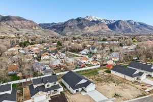 Aerial view of residential area with a mountain backdrop