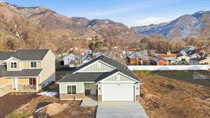 View of mountain background featuring nearby suburban area