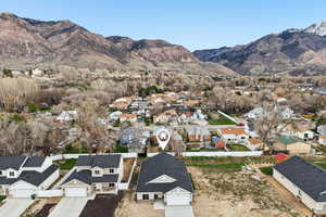 Aerial view of residential area with mountains