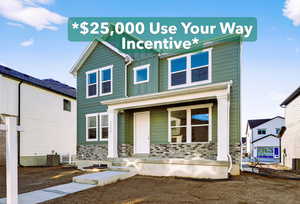 View of front of property featuring board and batten siding
