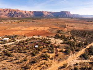 View of mountain background featuring rural landscape