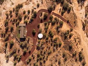 Aerial view of property and surrounding area with rural landscape