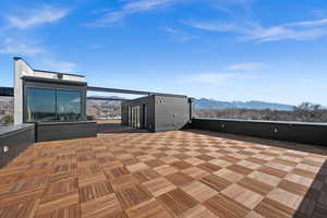 View of patio with a mountain view