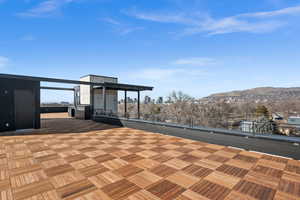 View of patio / terrace featuring a mountain view