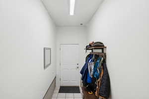 Entryway with tile patterned flooring