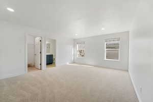 Unfurnished room featuring light carpet and recessed lighting