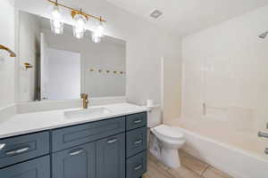 Full bathroom with vanity and  shower combination