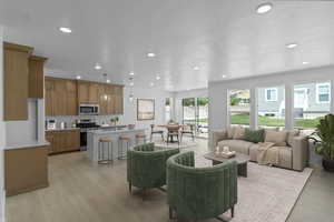 Living room featuring light wood-type flooring and recessed lighting