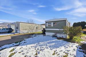 View of front of house with a mountain view