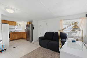 Living room featuring light wood-style flooring