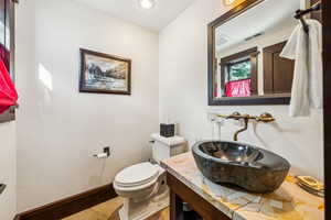 Half bath with vanity and recessed lighting