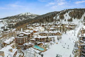 Snowy aerial view with a mountain view
