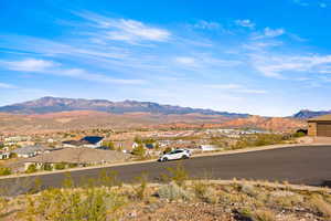 View of mountain background featuring nearby suburban area