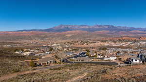 View of mountain backdrop with nearby suburban area