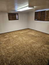 Unfurnished room featuring carpet