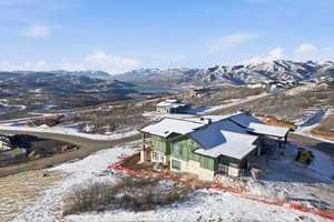 Snowy aerial view with a mountain view