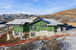 View of front of property with a mountain view