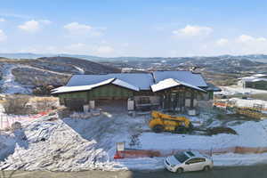 View of front of home with a mountain view