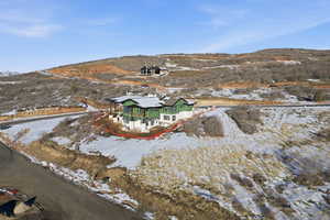 Snowy aerial view with a mountain view