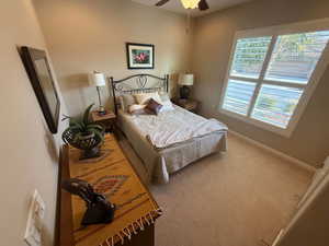 2nd Bedroom featuring carpet and ceiling fan
