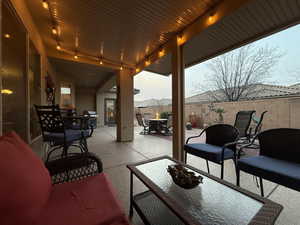 View of patio with outdoor dining area
