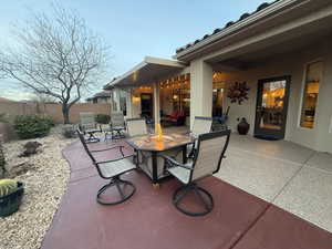 View of patio / terrace with a fire pit
