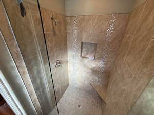 Casita bathroom featuring a fully tiled shower stall