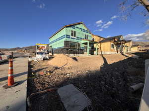 Rear view of property with a patio