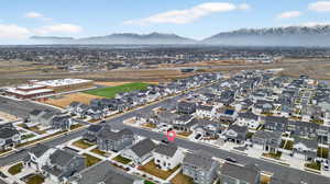 Aerial view of residential area with a mountain backdrop